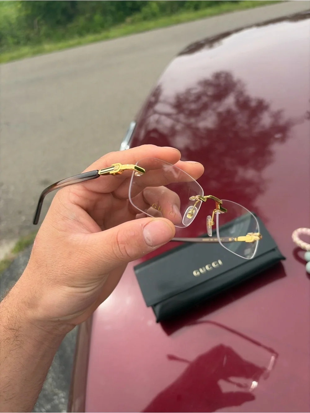 Gucci Rimless Sunglasses with Gold Hardware and Black Temples
